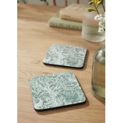Lifestyle view of Green Tapestry Sage Pimpernel coasters on table