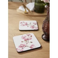 Pink Blossom coasters by Pimpernel on wooden table