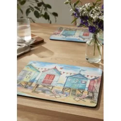 Wooden table with Beach Huts placematsand vase