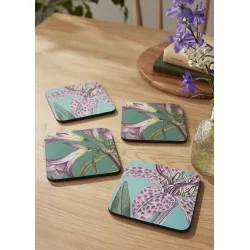 Wooden tabletop with Botanic Garden Flora & Fauna drinks coaster set